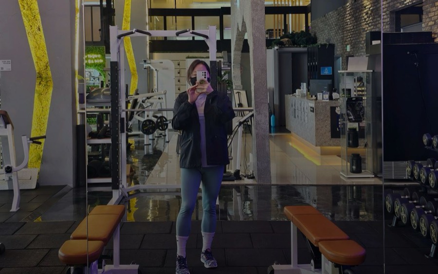 The client in the gym mirror